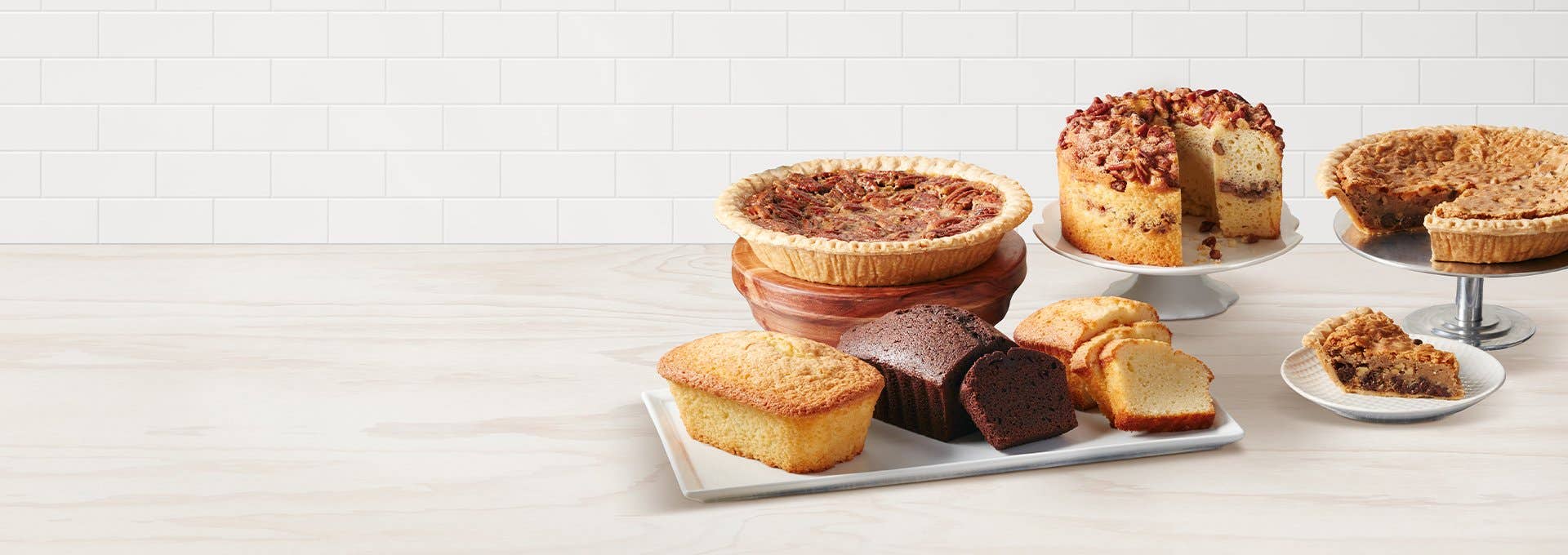 Various baked goods and pies on a table