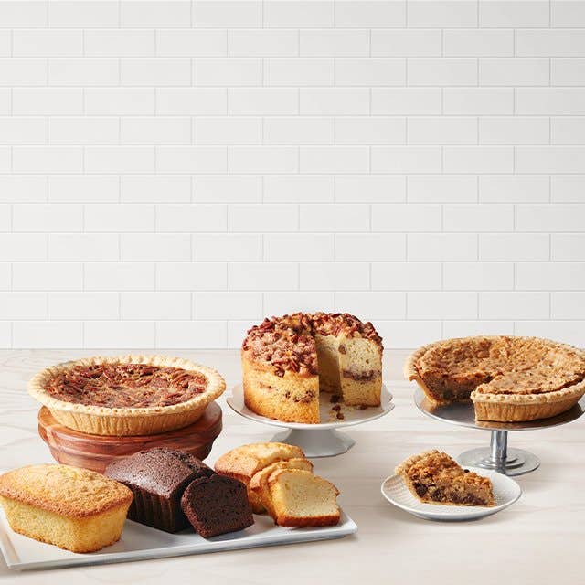 Various baked goods and pies on a table